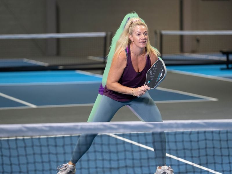 woman playing pickleball